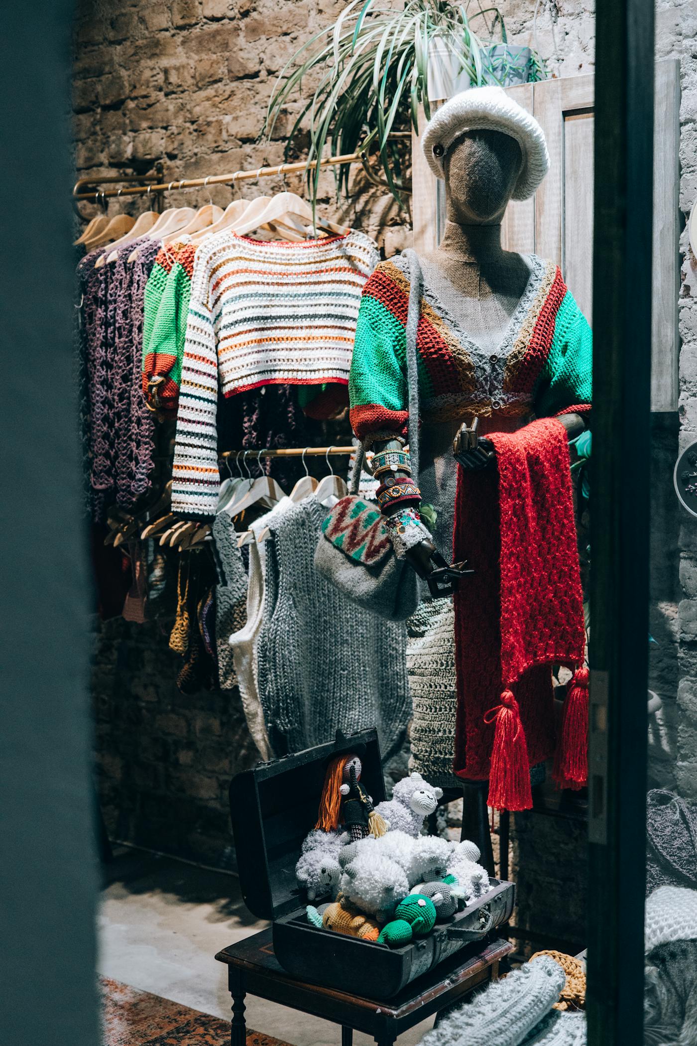 Finished knitwear range displayed on a clothing rack